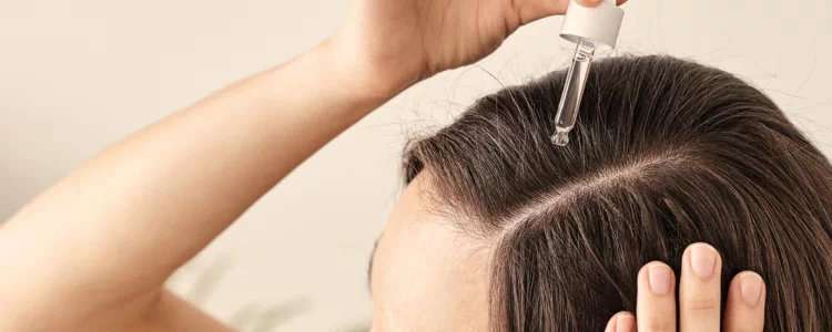 Application d'huiles naturelles pour favoriser la pousse rapide des cheveux