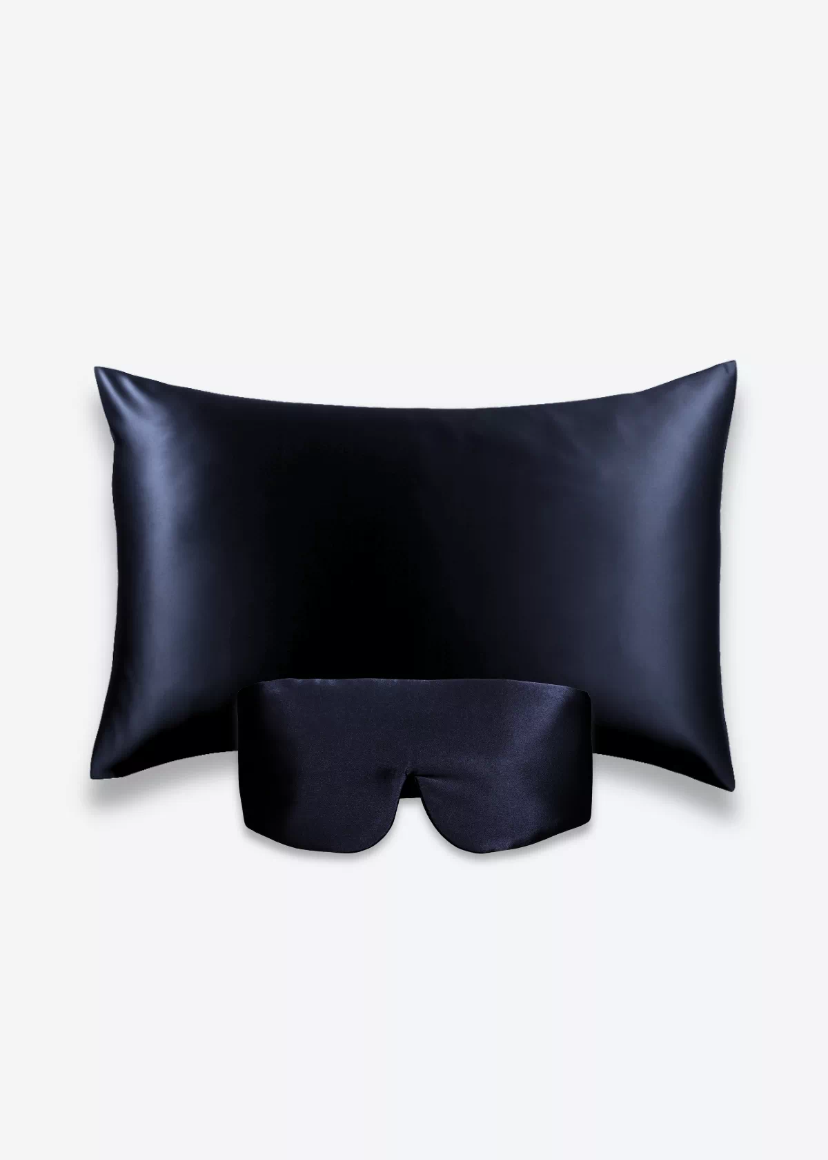 Coffret Beauty Sleep Bandeau : taie d’oreiller et masque bandeau réglable en soie bleu nuit.