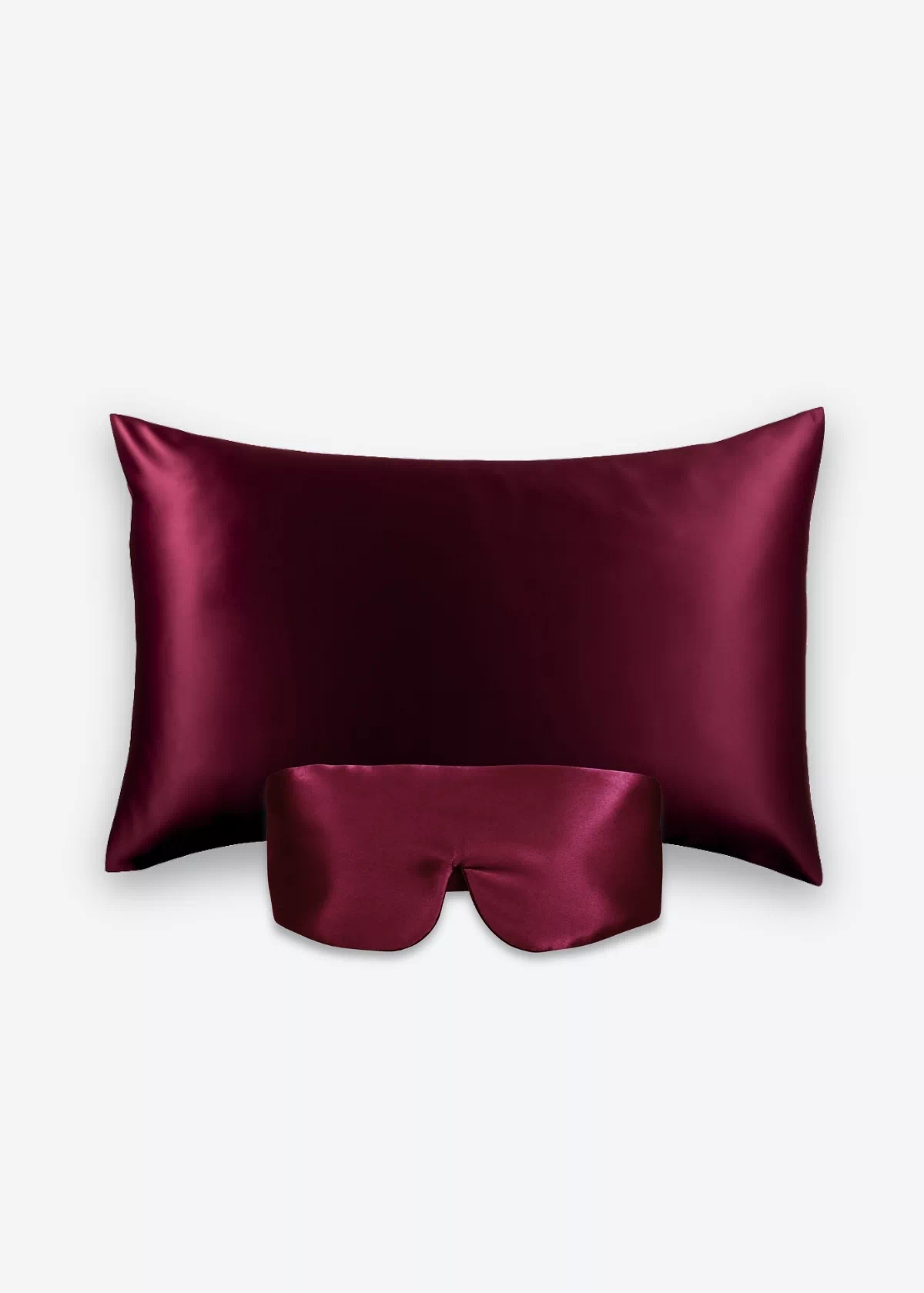 Coffret Beauty Sleep Bandeau : taie d’oreiller et masque bandeau réglable en soie bordeaux.