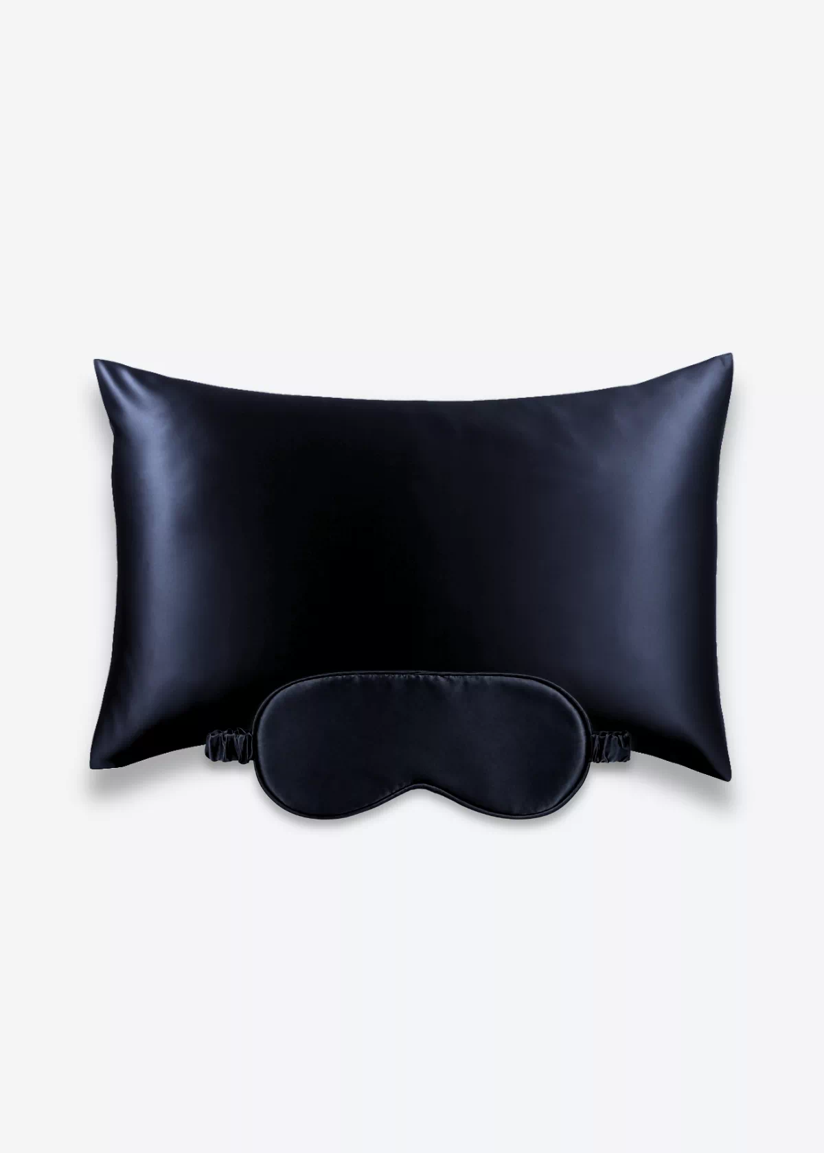 Coffret Beauty Sleep : taie d’oreiller et masque de nuit classique en soie bleu nuit.
