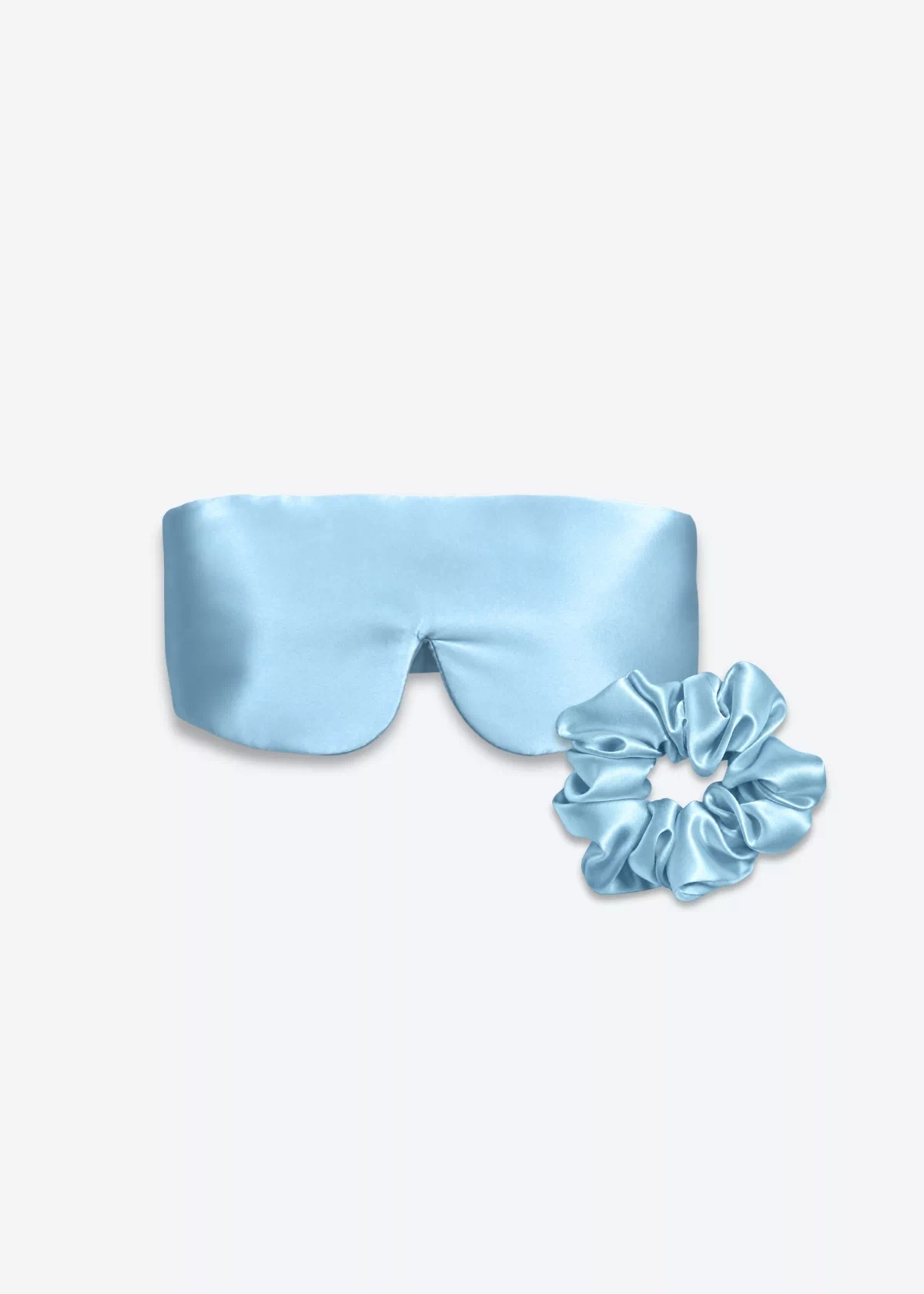 Coffret Duo Nuit Bandeau : masque bandeau réglable et grand chouchou en soie bleu ciel.