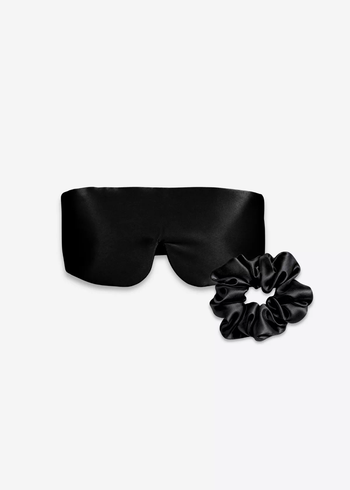 Coffret Duo Nuit Bandeau : masque bandeau réglable et grand chouchou en soie noire.