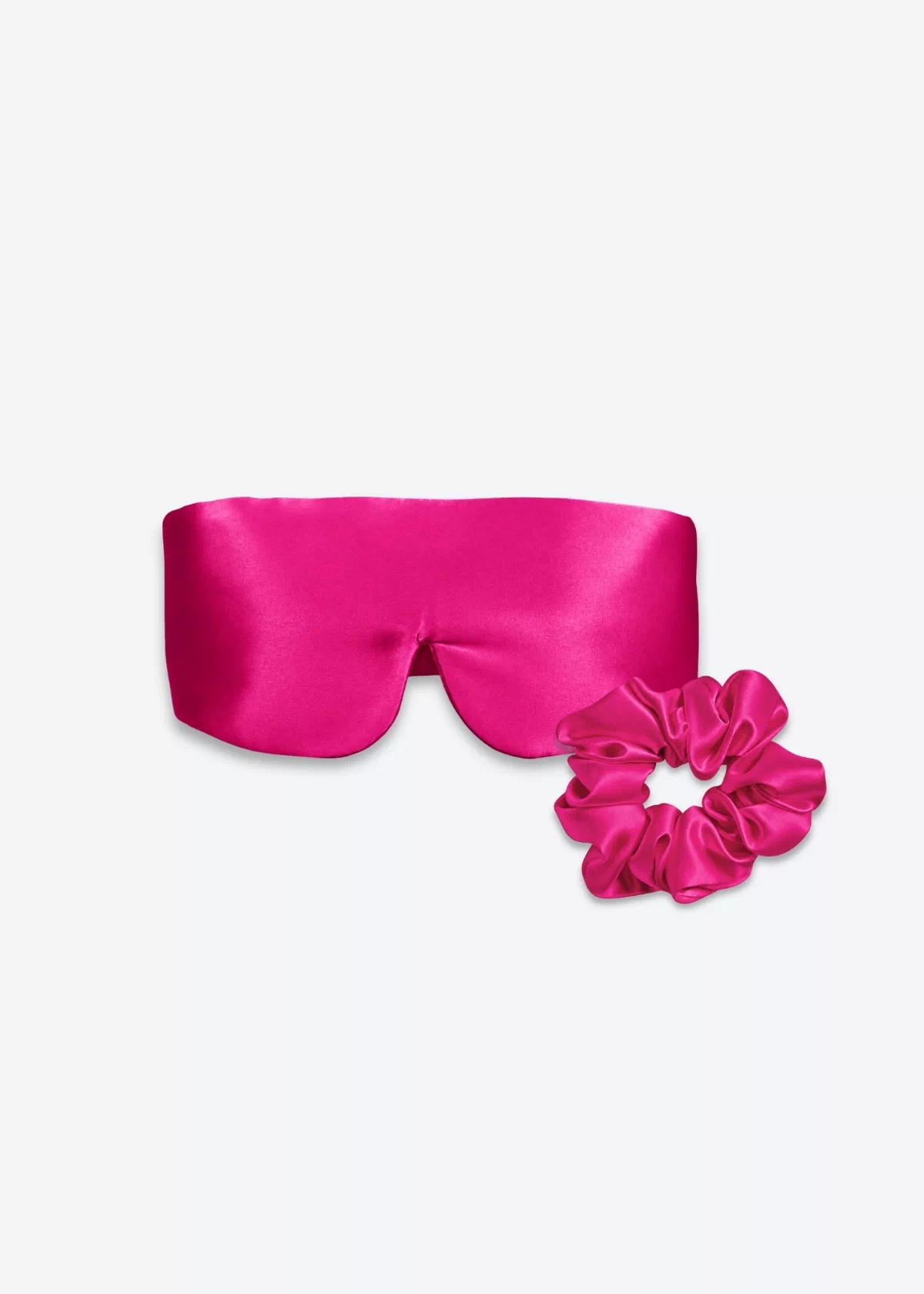Coffret Duo Nuit Bandeau : masque bandeau réglable et grand chouchou en soie rose fuchsia.