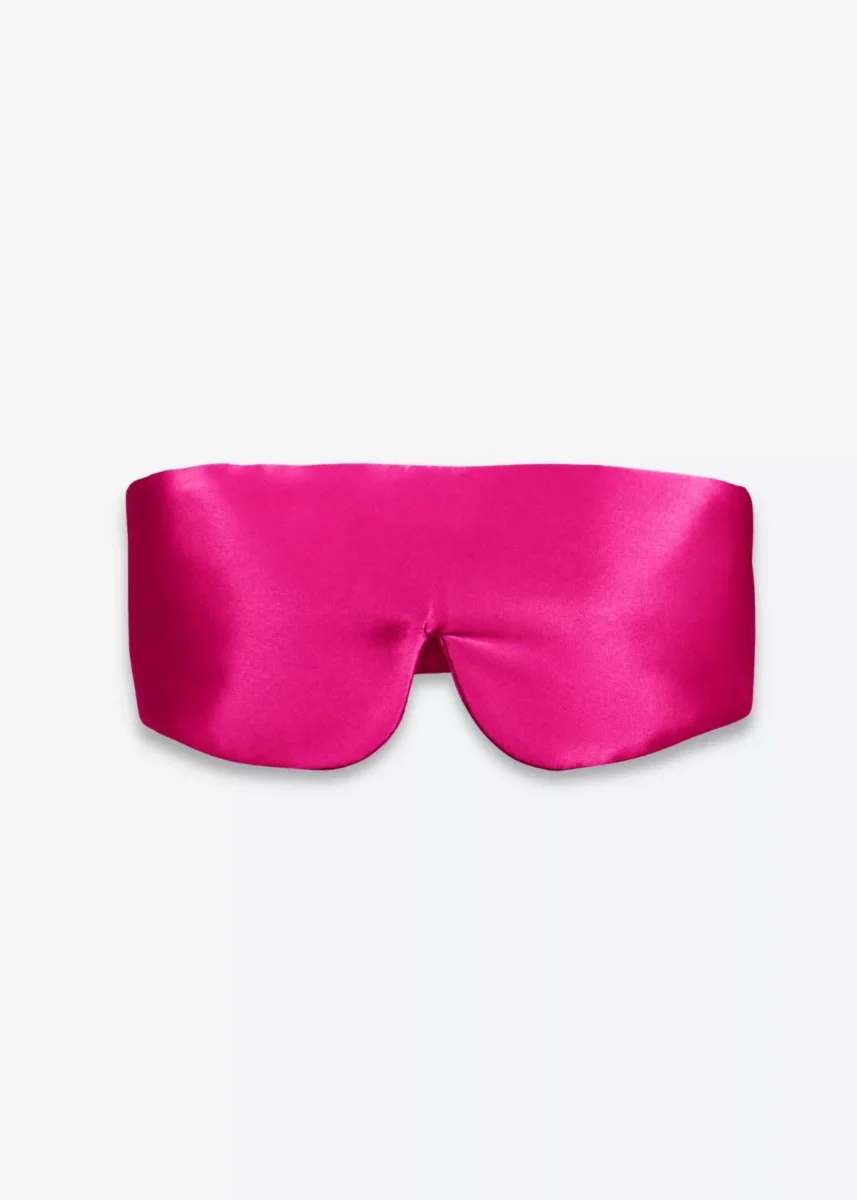 Masque bandeau réglable en soie rose fuchsia, vu de face.