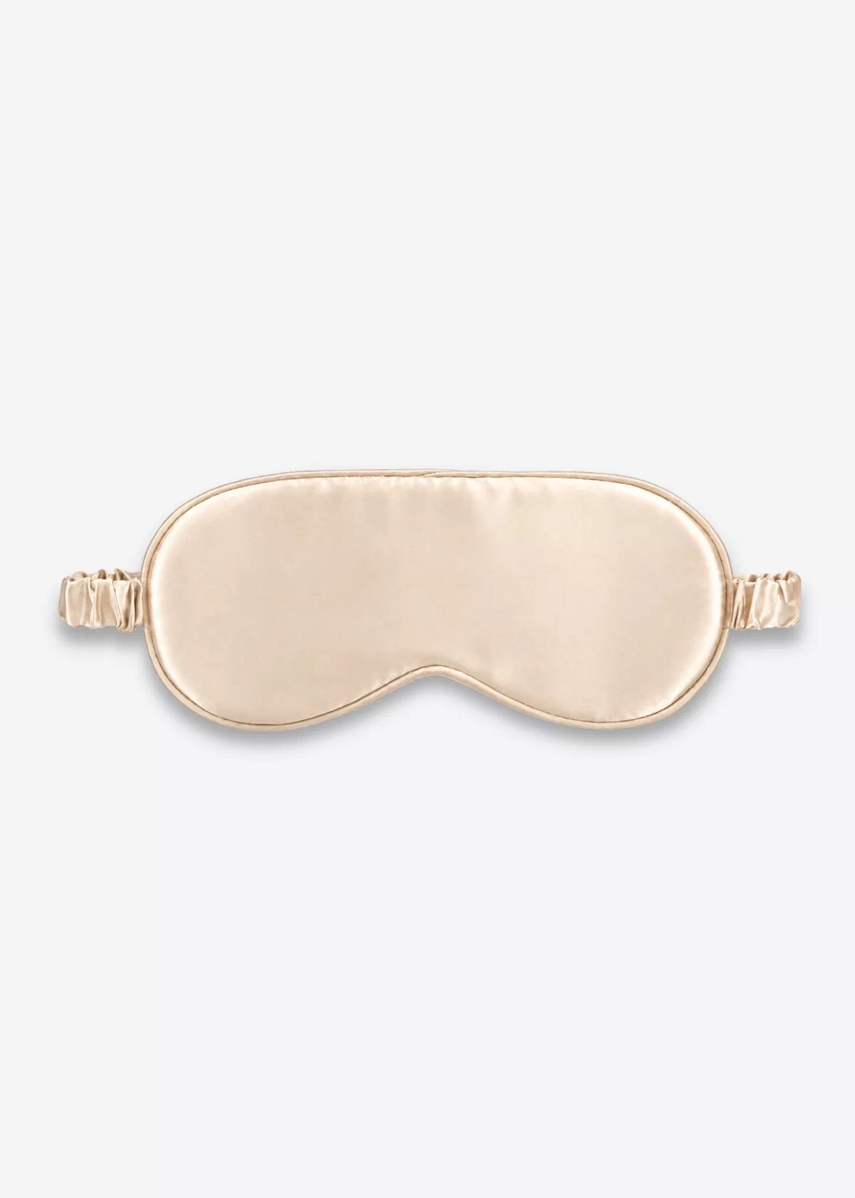 Masque de nuit classique en soie champagne, vu de face.
