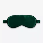 Masque de nuit classique en soie vert sapin, vu de face.